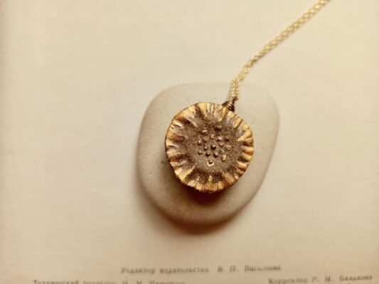 ceramic gold-brown flower diffuser necklace