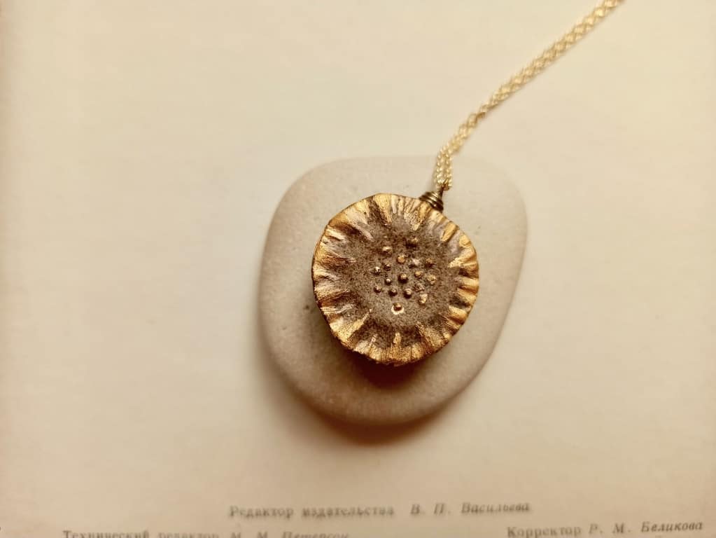 ceramic gold-brown flower diffuser necklace