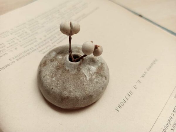 White flat vase