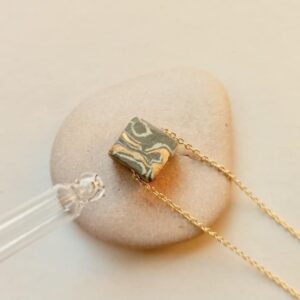 twisted-colored-body diffuser stone necklace