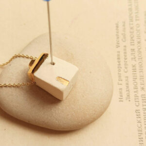 golden house diffuser necklace