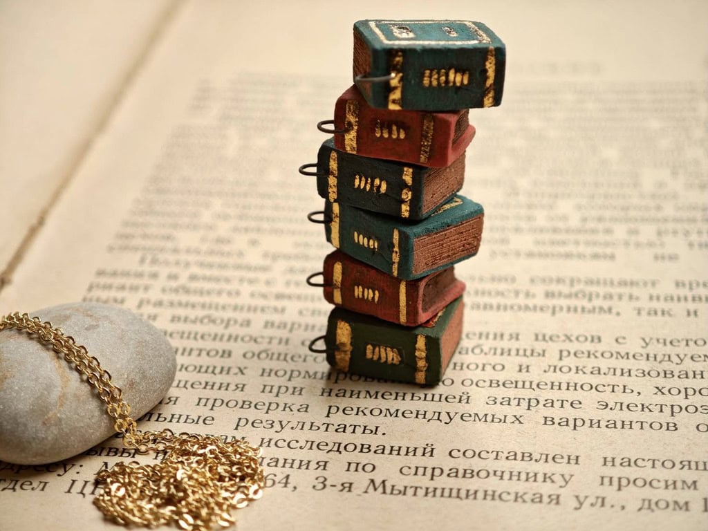 Dark Academia_ Secret Pages Vintage Book Ceramic Diffuser Necklace