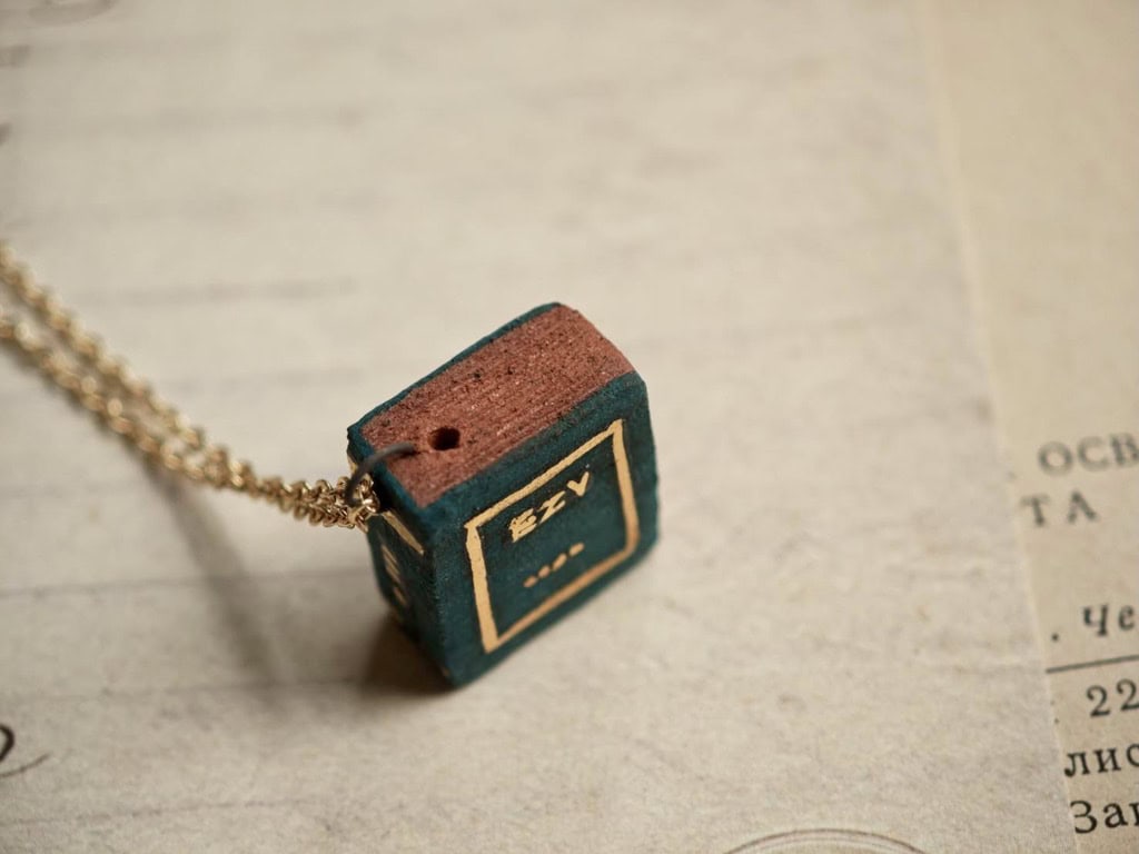 Dark Academia_ Secret Pages Vintage Book Ceramic Diffuser Necklace