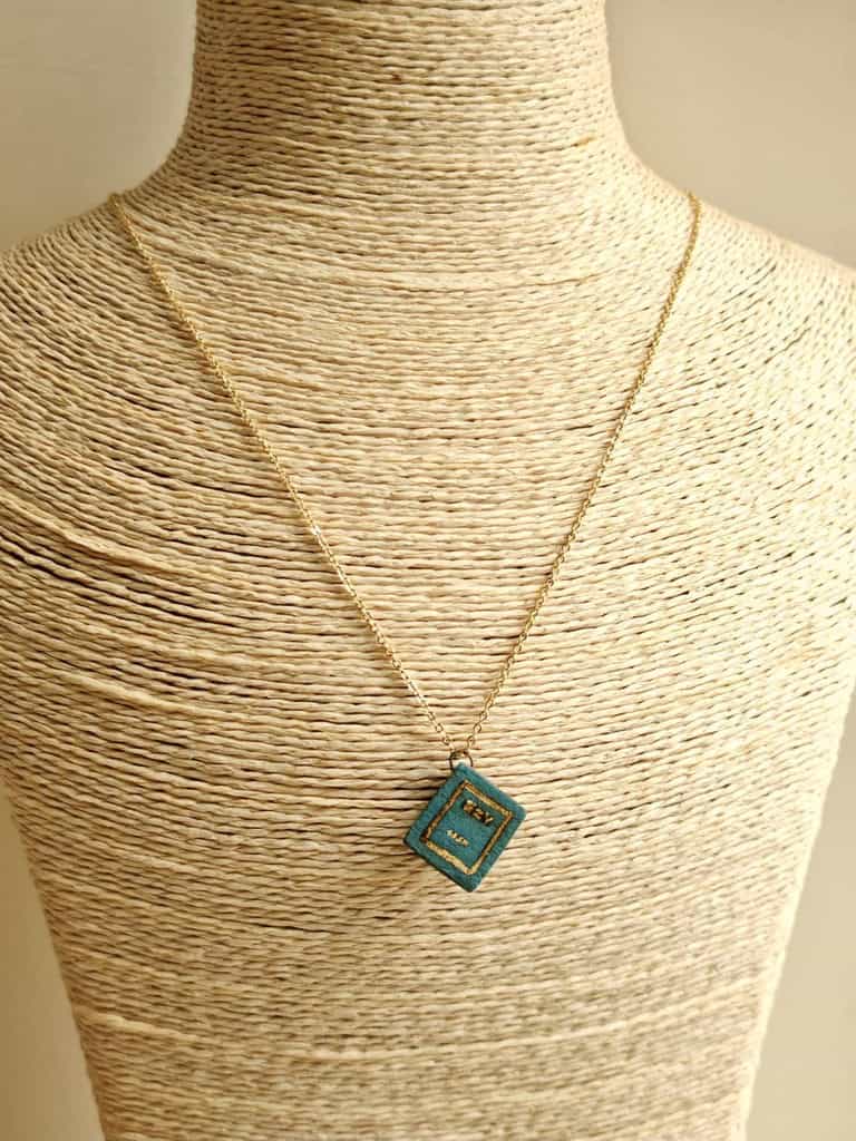 Dark Academia_ Secret Pages Vintage Book Ceramic Diffuser Necklace